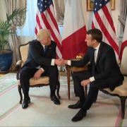 President Trump And Strong Handshake With New President Macron